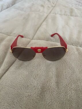 Versace Red and Gold Rimless Sunglasses with Crest Accent